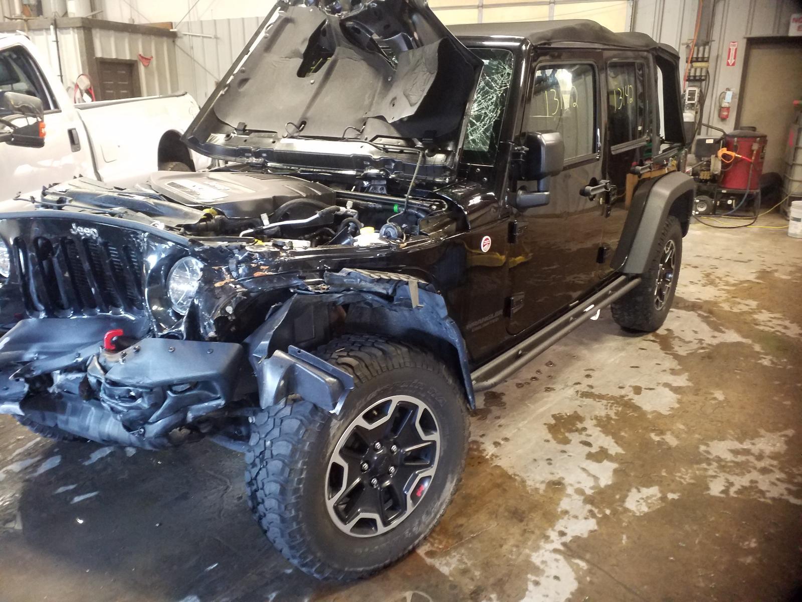 Arriba 84+ imagen wrecked jeep wrangler for sale near me